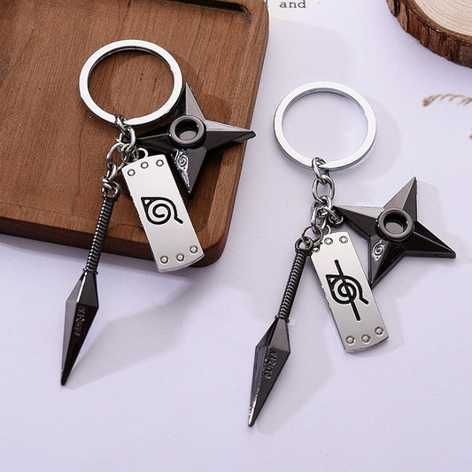 Llavero de Konoha con Kunai y Shuriken - Naruto